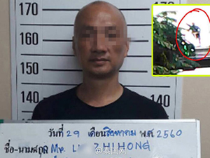 中国男子在泰国砸车被捕 车顶被砸得面目全